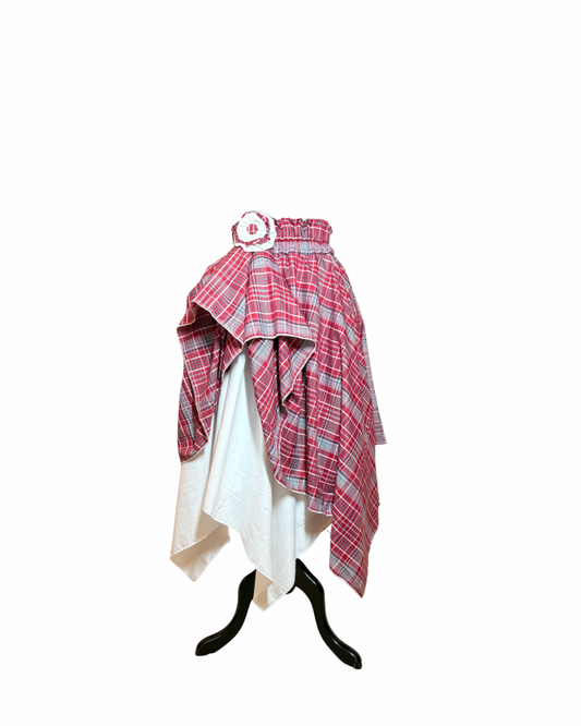 Jamaican bandana asymmetrical hem skirt with white handkerchief hem underskirt and matching fabric flower at the waist.