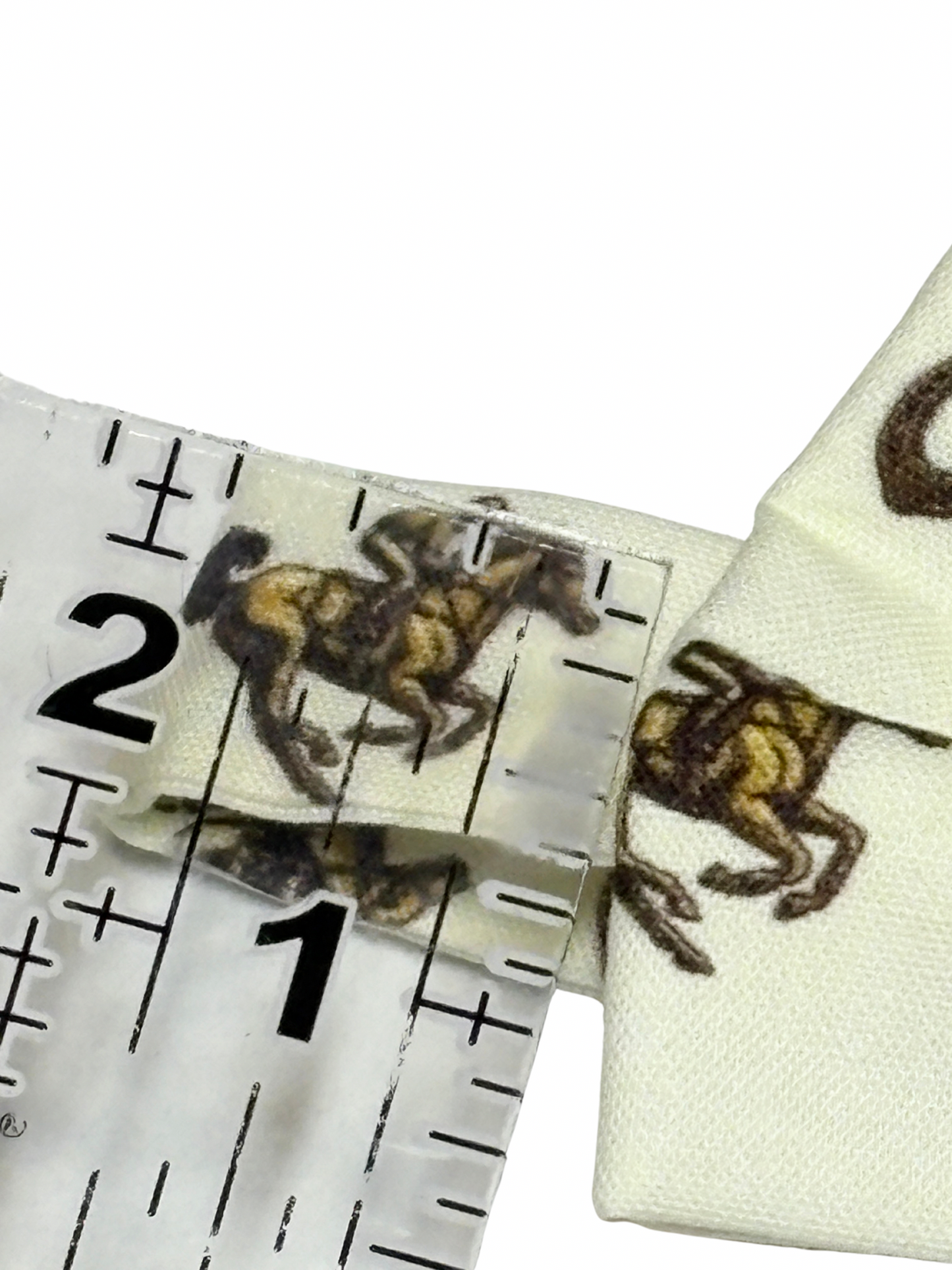 Gorgeous ivory with brown derby horses and jockey pretied bow tie and adjustable neckband.