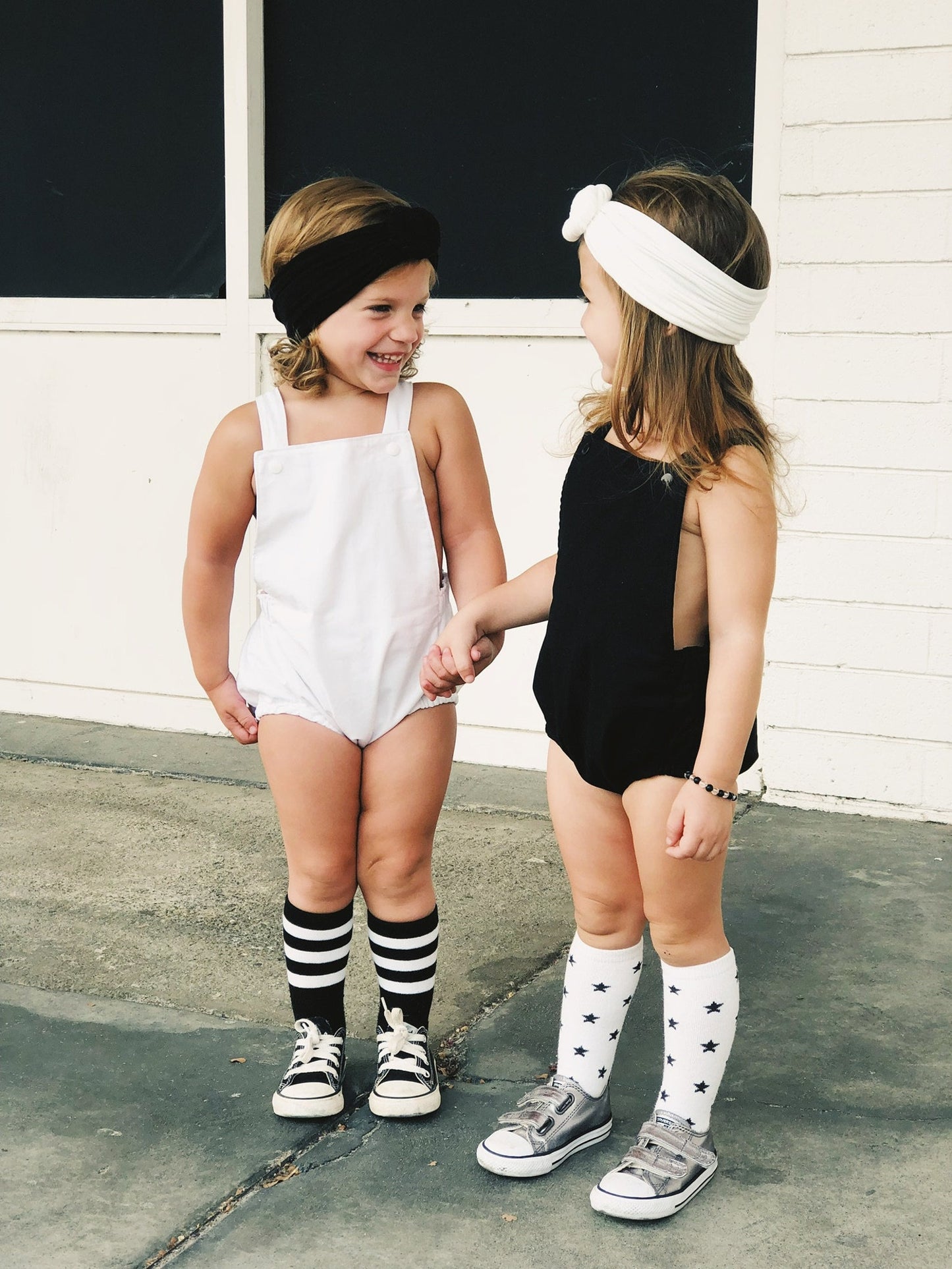 Girl in black boho romper