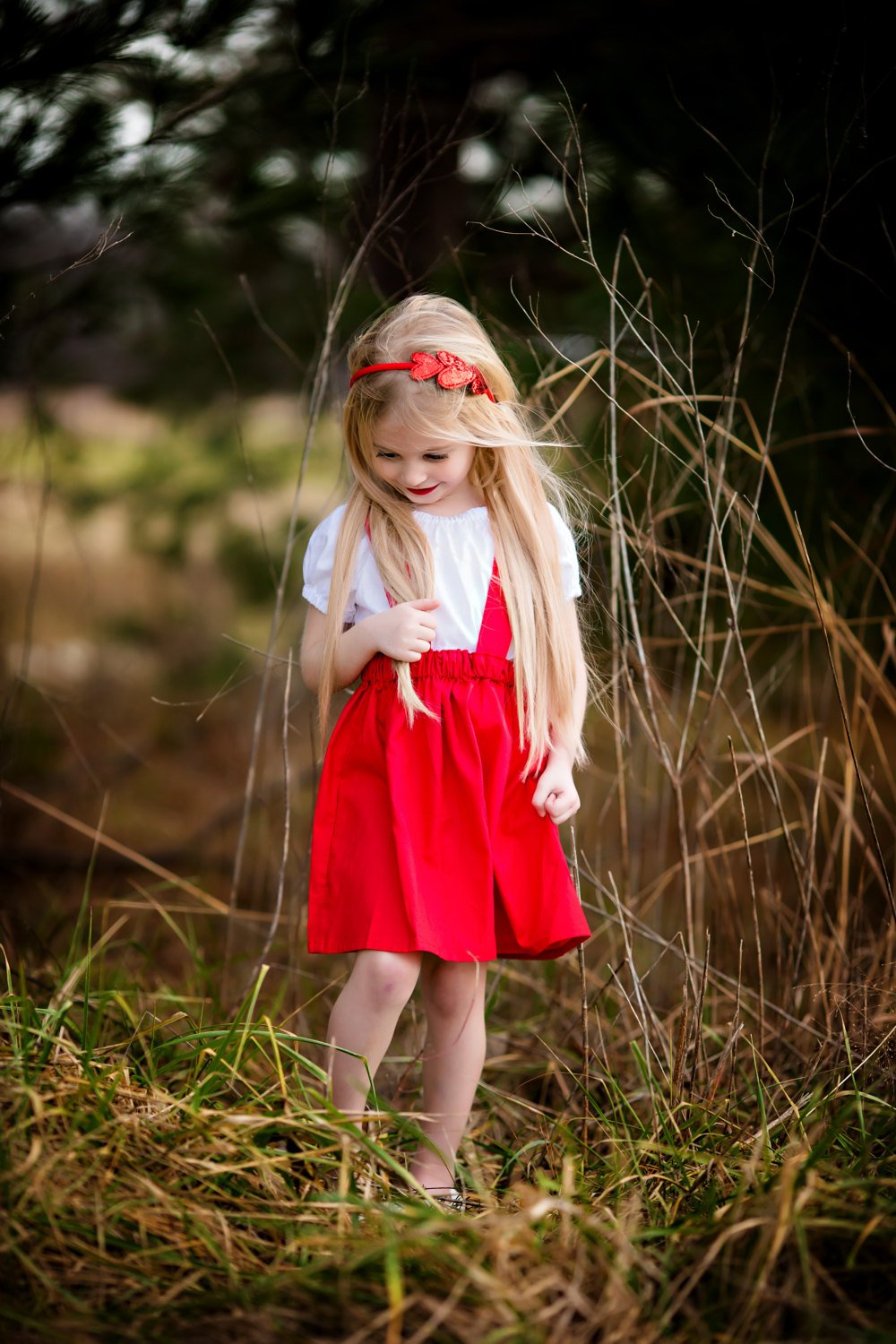 Red suspender skirt.