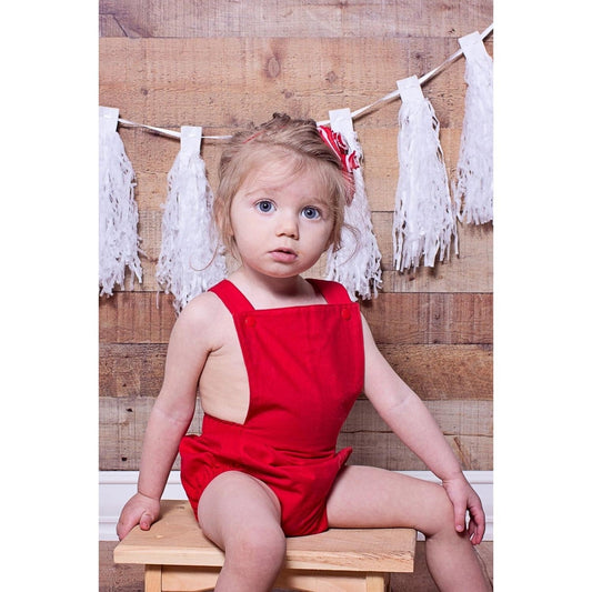 Pelele rojo para bebé niña