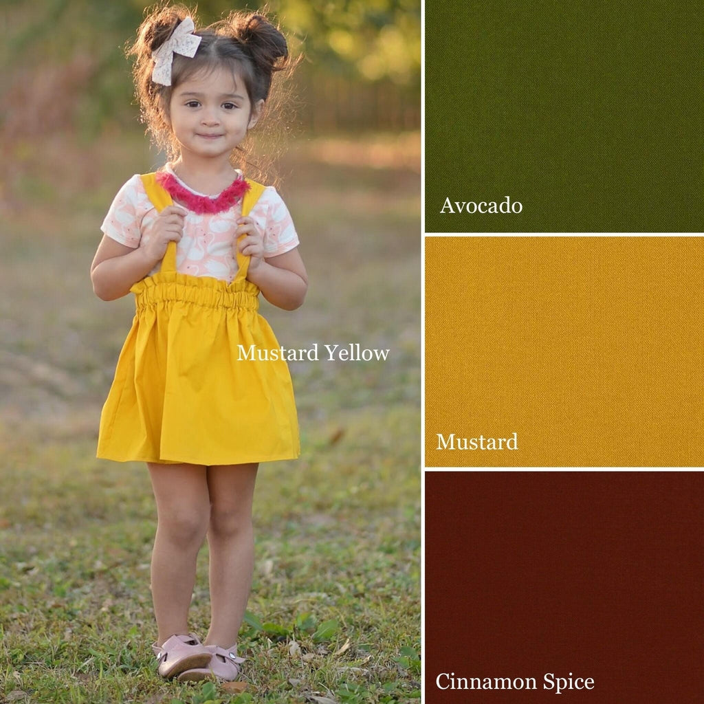 Mustard yellow suspender skirt with additional color options