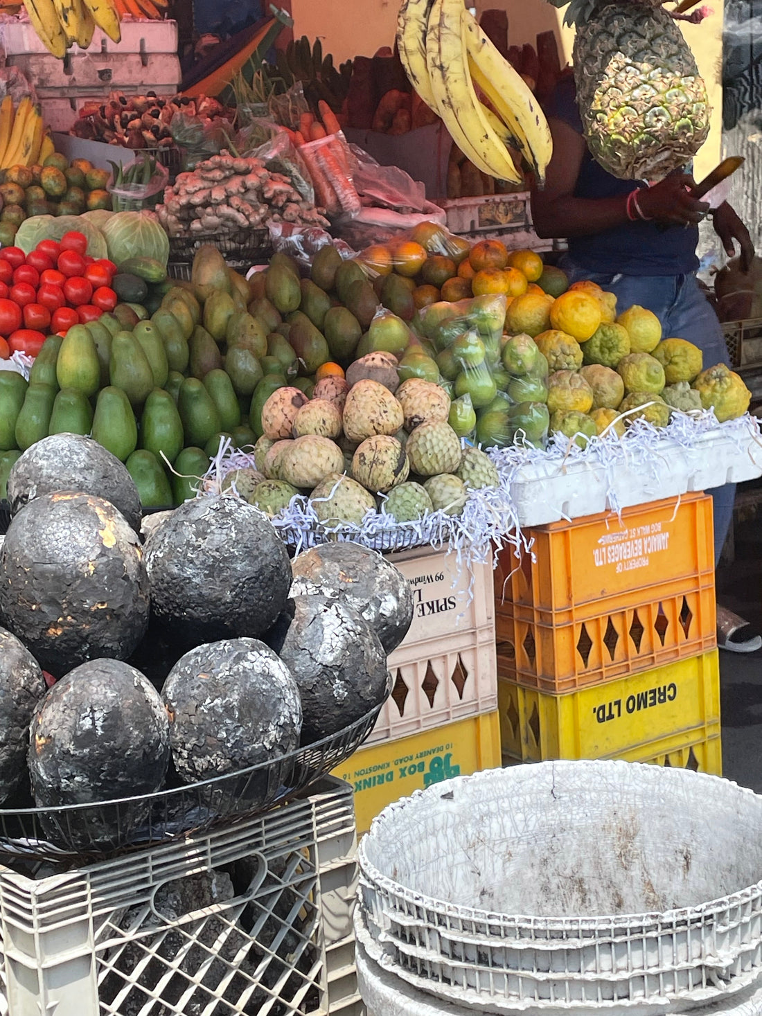 Vendors in Kingston Jamaica selling a variety of fruits