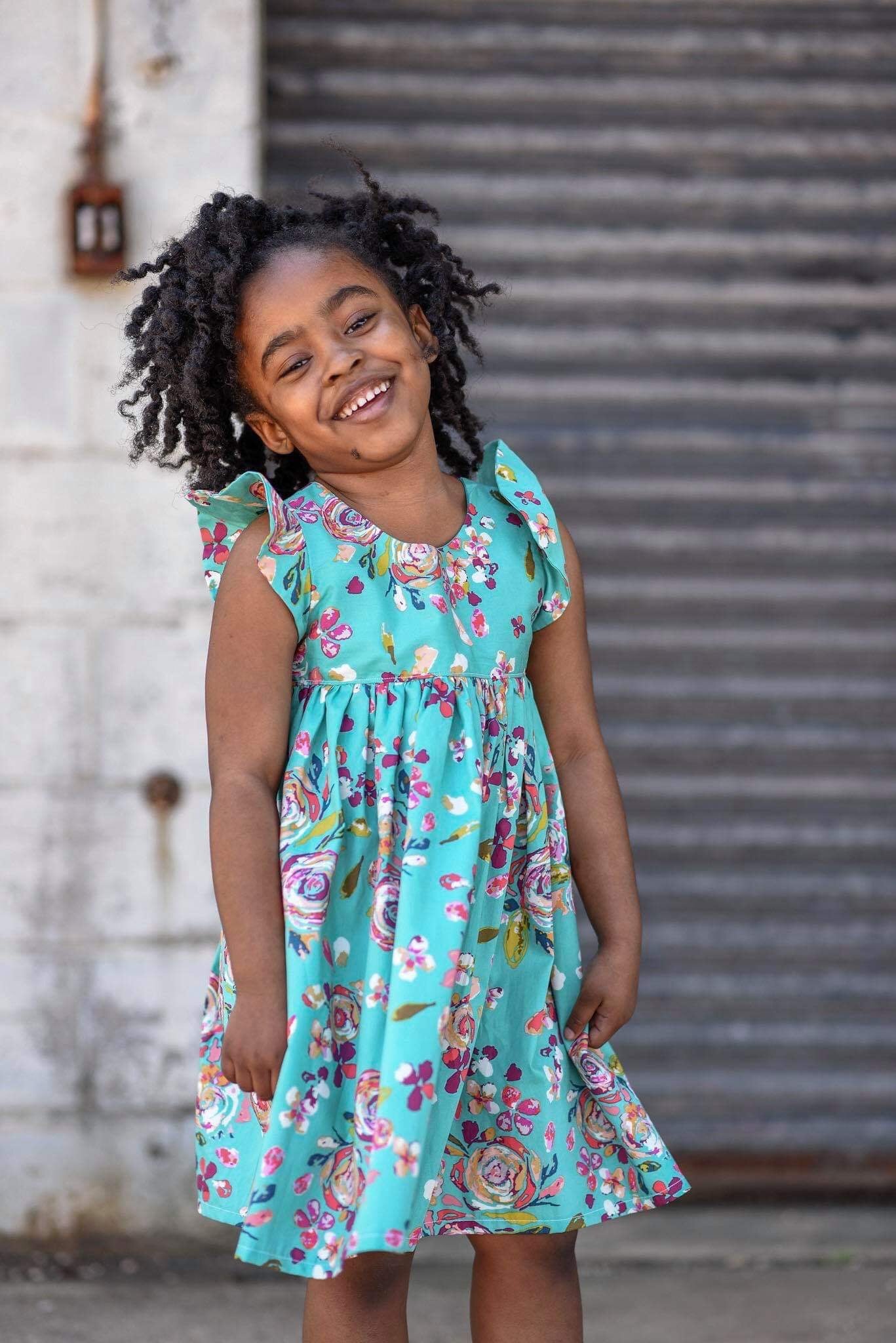 Girl’s Christmas Poinsettia Knit Dress with Pockets