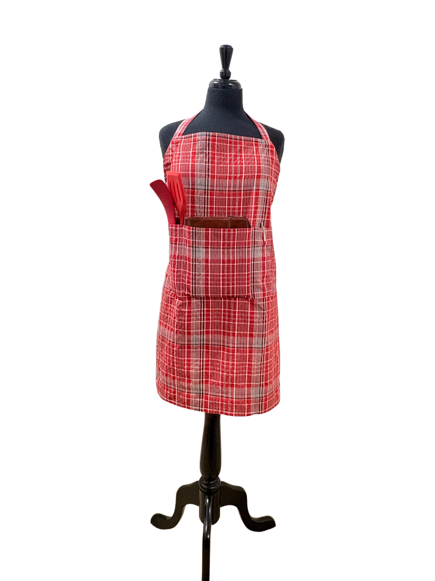 Handmade Jamaican bandana apron in authentic plaid cotton, with adjustable strap, tie-back waist, and three-compartment pocket. Ideal gift apron for cooks, crafters, and grill lovers. Unisex fit from Teen/XS to 3XL, cultural kitchen and BBQ style