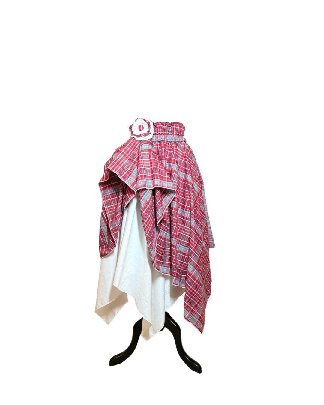 Jamaican bandana asymmetrical hem skirt with white handkerchief hem underskirt and matching fabric flower at the waist. 