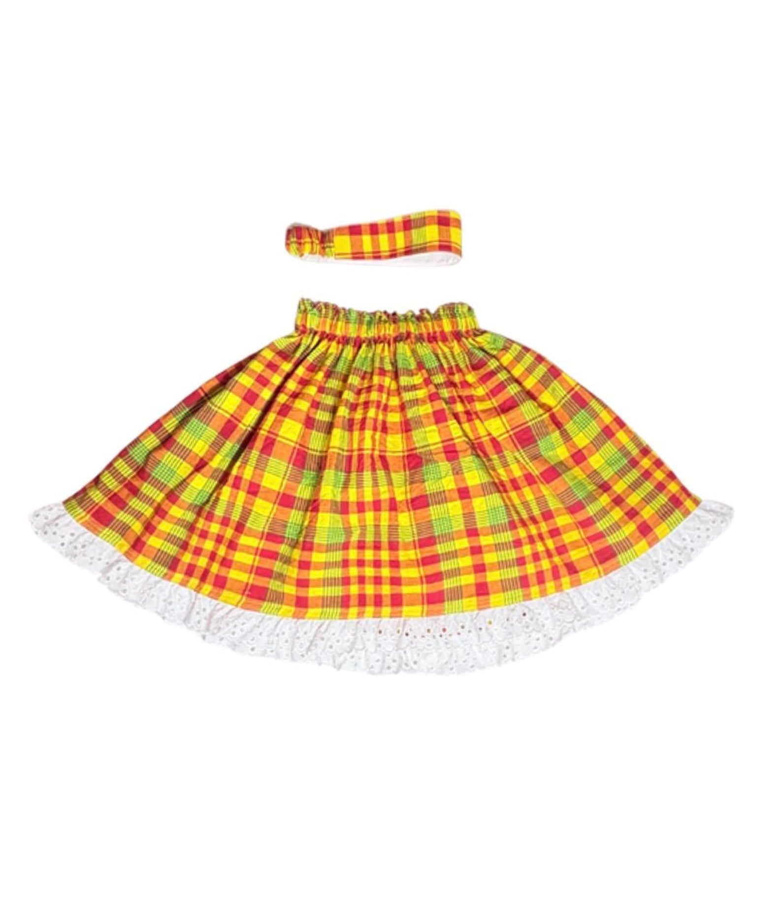 Jamaican and Dominican madras plaid skirt with yellow and red pattern and matching headband on a white background